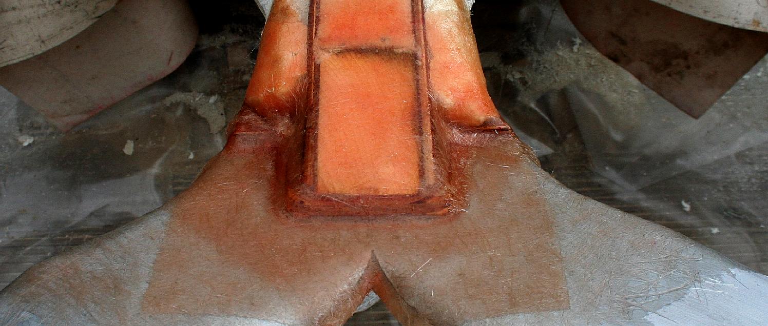 Reinforcing the mermaid fins with polyester resin and glass matting